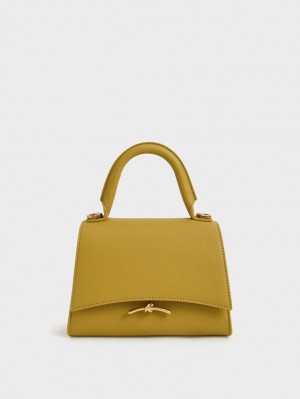 τσαντα χειροσ Charles And Keith Huxley Metallic Push-Lock Top μουστάρδα | 25018-XWPL