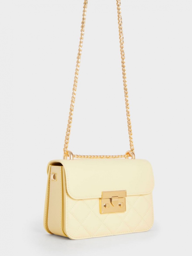 τσάντεσ χιαστί Charles And Keith Metallic Push-Lock Chain κίτρινα | 07498-VIGT