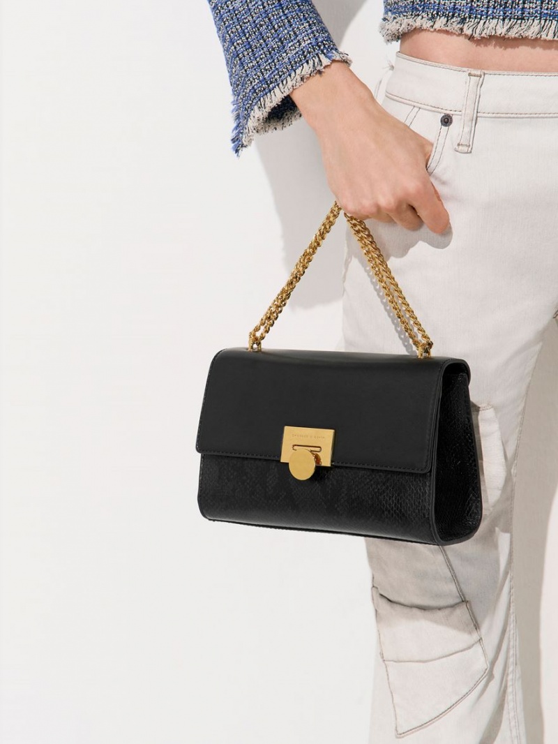 τσάντα clutch Charles And Keith Snake Print Metallic Accent μαυρα | 90763-AUMZ