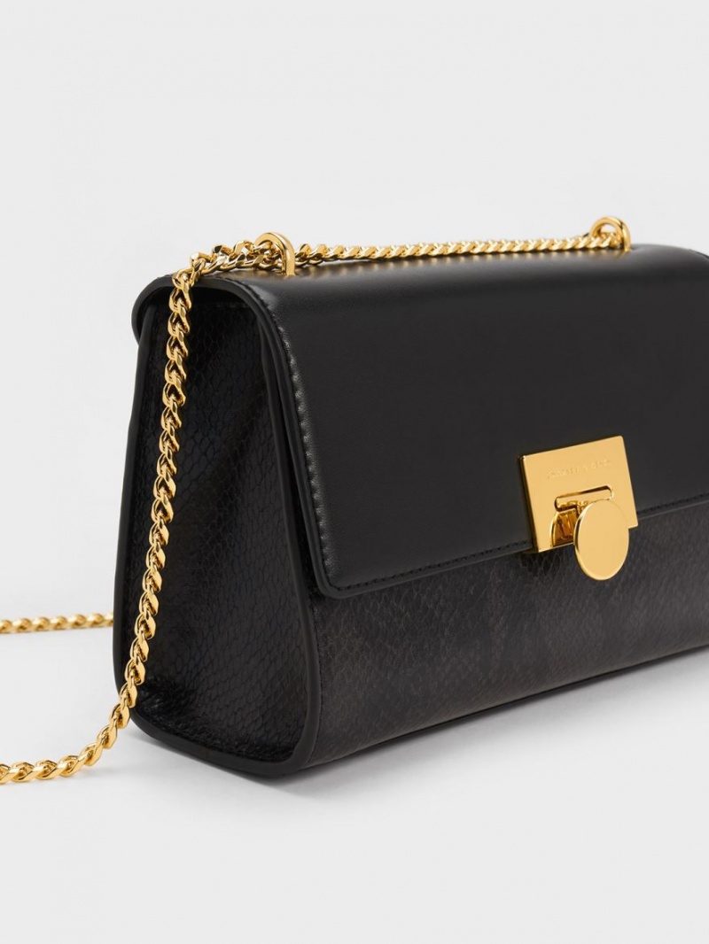 τσάντα clutch Charles And Keith Snake Print Metallic Accent μαυρα | 90763-AUMZ