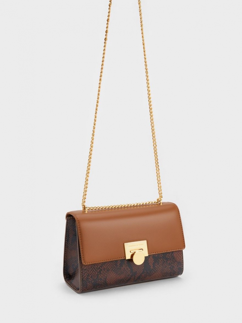 τσάντα clutch Charles And Keith Snake Print Metallic Accent καφε | 79085-XECW