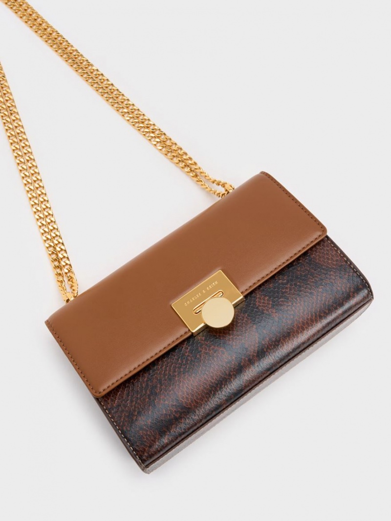 τσάντα clutch Charles And Keith Snake Print Metallic Accent καφε | 79085-XECW