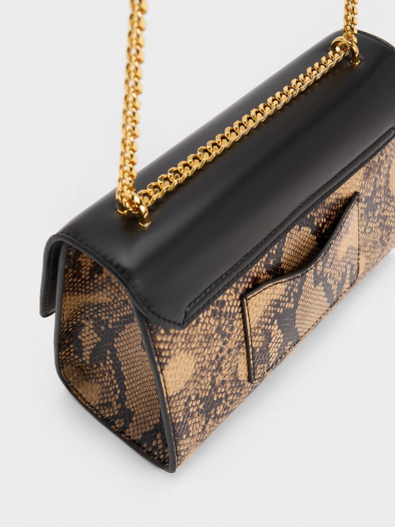 τσάντα clutch Charles And Keith Snake Print Metallic Accent μαυρα | 63102-UGNE