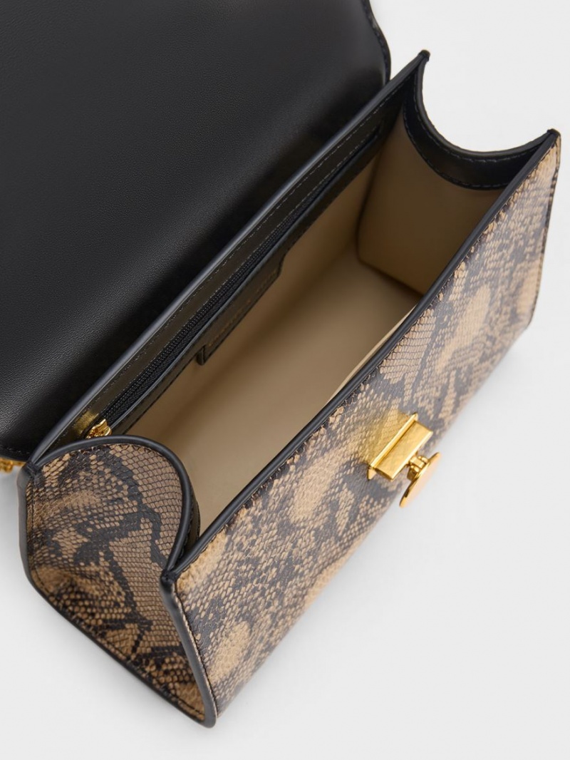 τσάντα clutch Charles And Keith Snake Print Metallic Accent μαυρα | 63102-UGNE