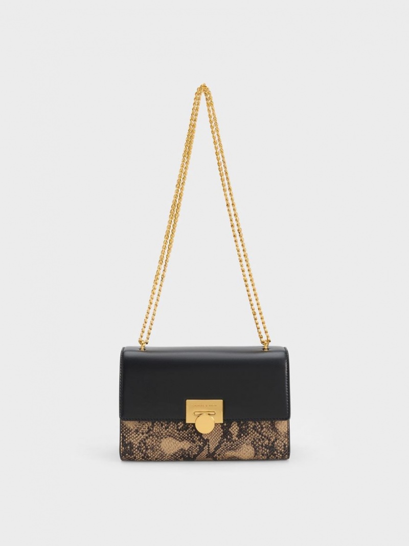τσάντα clutch Charles And Keith Snake Print Metallic Accent μαυρα | 63102-UGNE