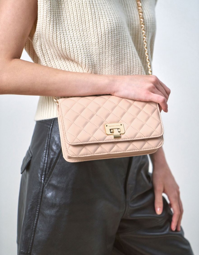 τσάντα clutch Charles And Keith Καπιτονέ Flip-Lock Μπεζ | 43516-DCZA