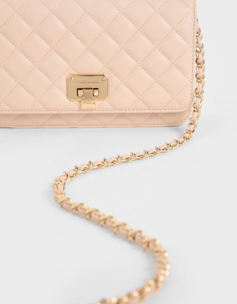 τσάντα clutch Charles And Keith Καπιτονέ Flip-Lock Μπεζ | 43516-DCZA