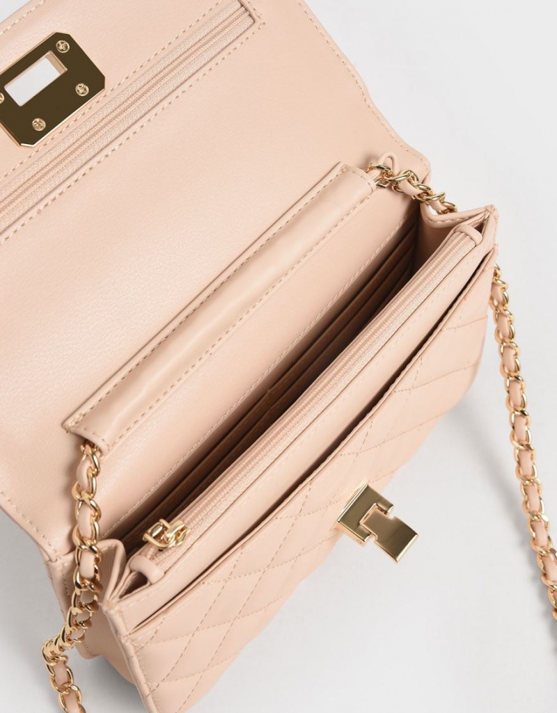 τσάντα clutch Charles And Keith Καπιτονέ Flip-Lock Μπεζ | 43516-DCZA