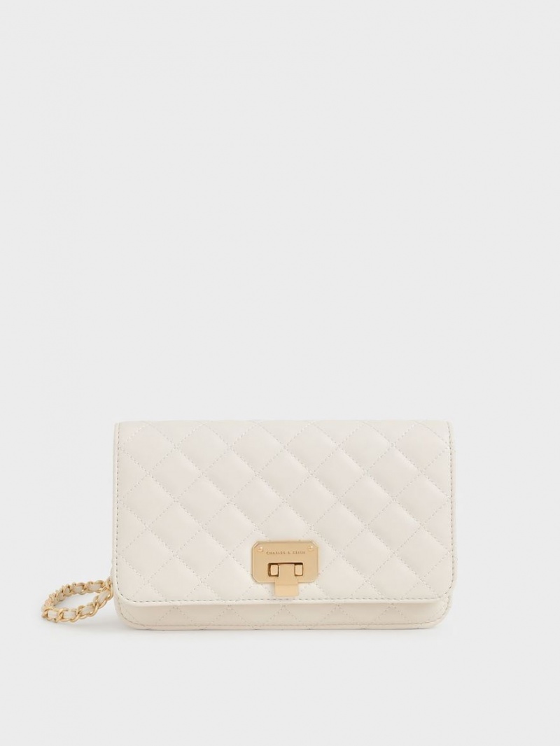 τσάντα clutch Charles And Keith Καπιτονέ Push-Lock κρέμα | 90128-HOKS