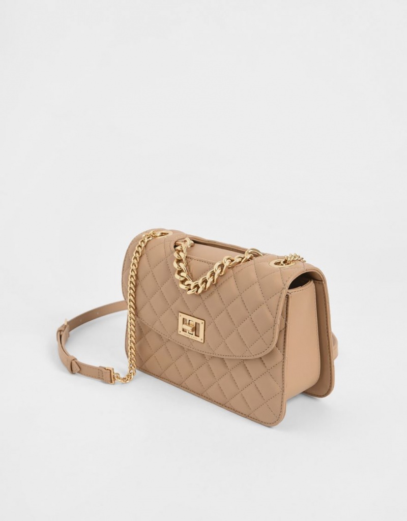 τσάντα clutch Charles And Keith Καπιτονέ Turn-Lock Μπεζ | 01258-MFEZ