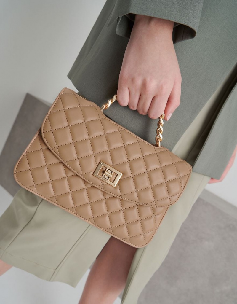 τσάντα clutch Charles And Keith Καπιτονέ Turn-Lock Μπεζ | 01258-MFEZ