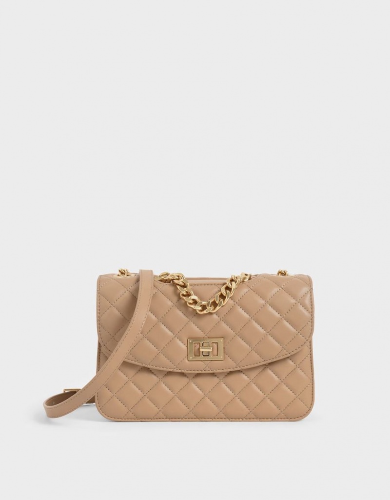 τσάντα clutch Charles And Keith Καπιτονέ Turn-Lock Μπεζ | 01258-MFEZ