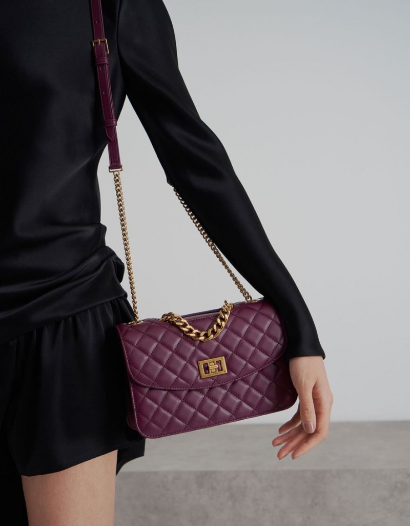 τσάντα clutch Charles And Keith Καπιτονέ Turn-Lock μωβ | 97368-MHNJ