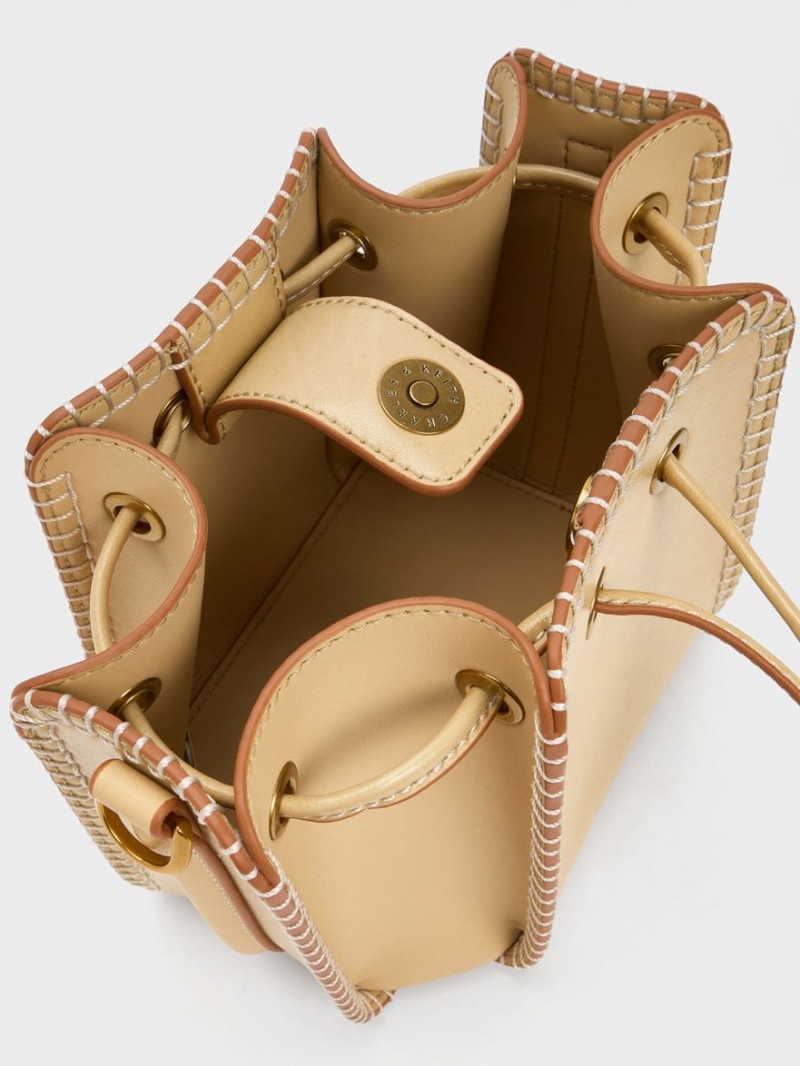 bucket bags Charles And Keith Circe Stitch-Trim Μπεζ | 14375-BNRS