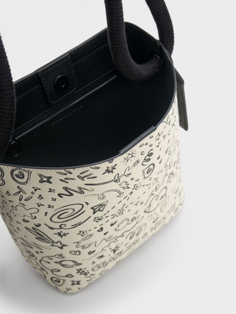 bucket bags Charles And Keith Gwiana Knotted Printed κρέμα | 46905-OEVA