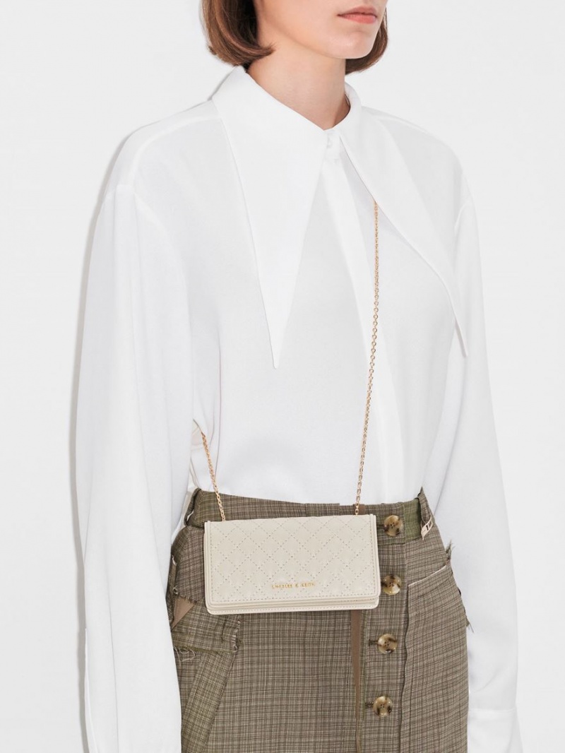 pouches Charles And Keith Καπιτονέ κρέμα | 42139-MOLI